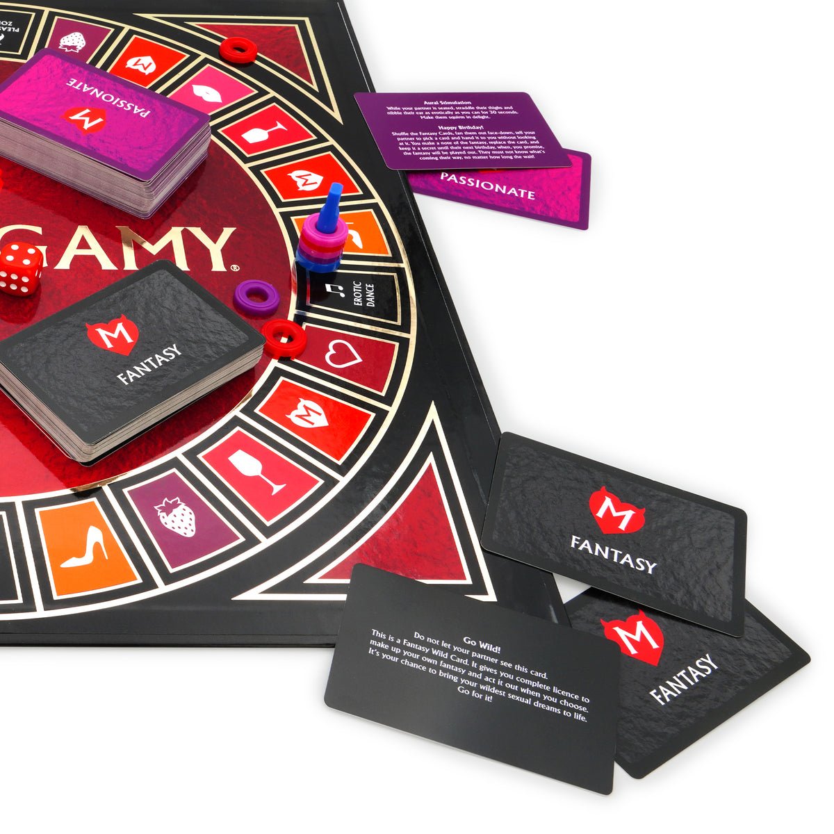 Close-up of Monogamy Fantasy cards beside the board, dice and Passionate card deck