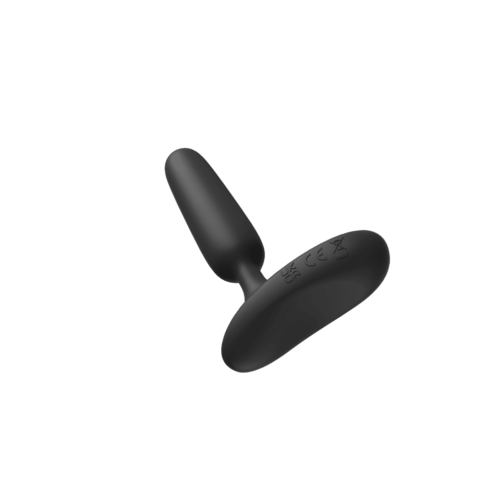 Lovense Glint black butt plug at an angle, showing the rounded tip and the curved touch-responsive base