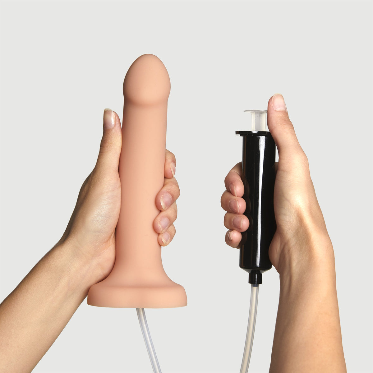 Strap On Me Squirting Cum Dildo in Vanilla, with its syringe