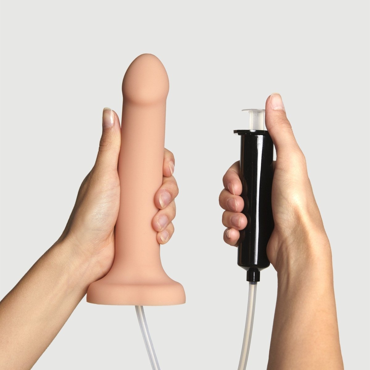Strap On Me Squirting Cum Dildo in Vanilla, with its syringe