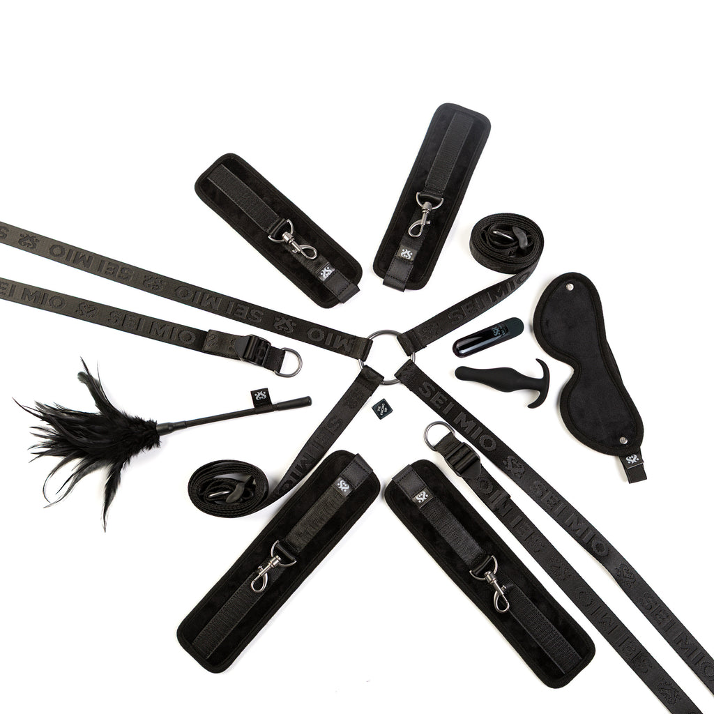 Sei Mio Complete Surrender bed tether seduction set on a white background, showing all seven pieces