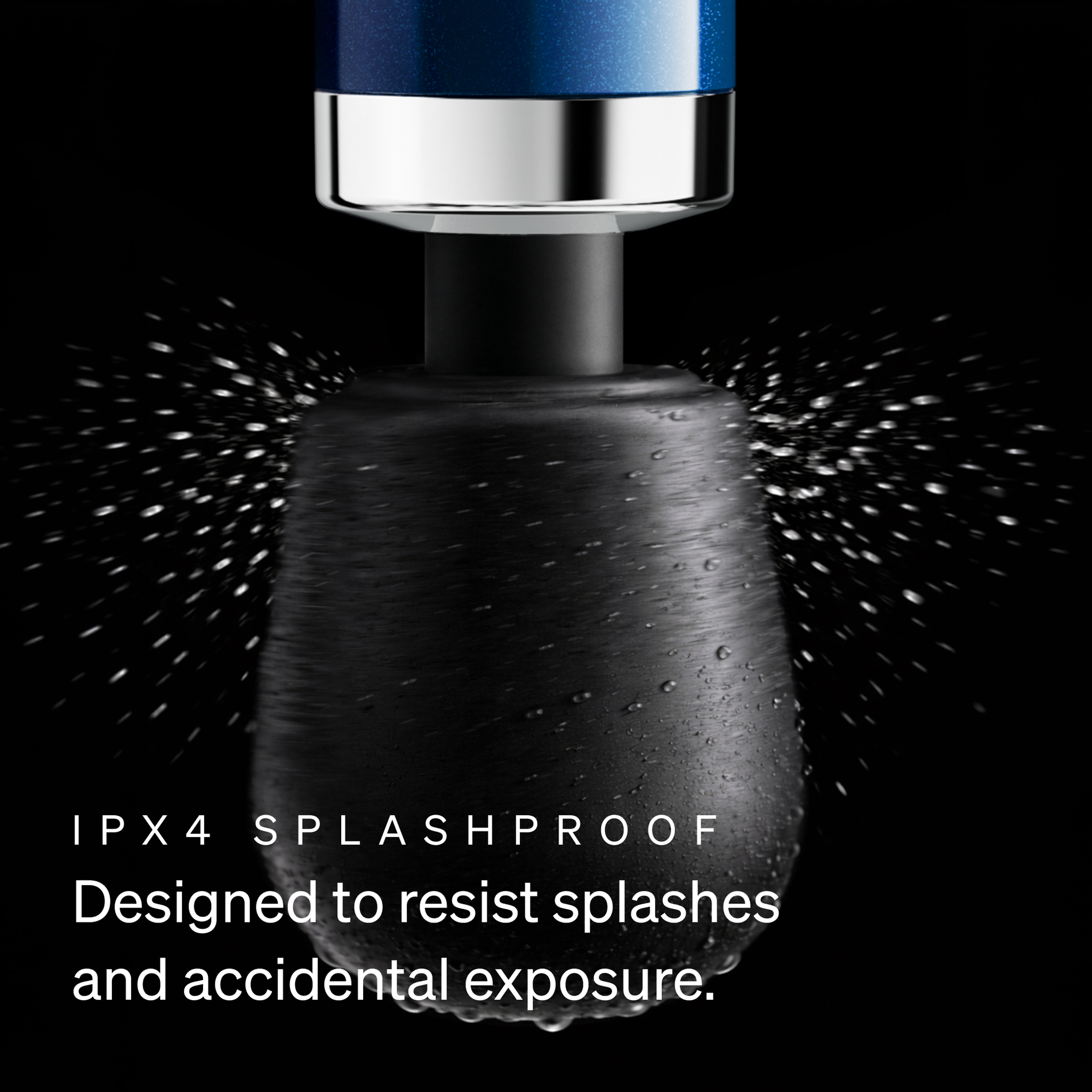 Doxy Die Cast Compact Cordless wand massager head being splashed with water, showing its IPX-4 splashproof design