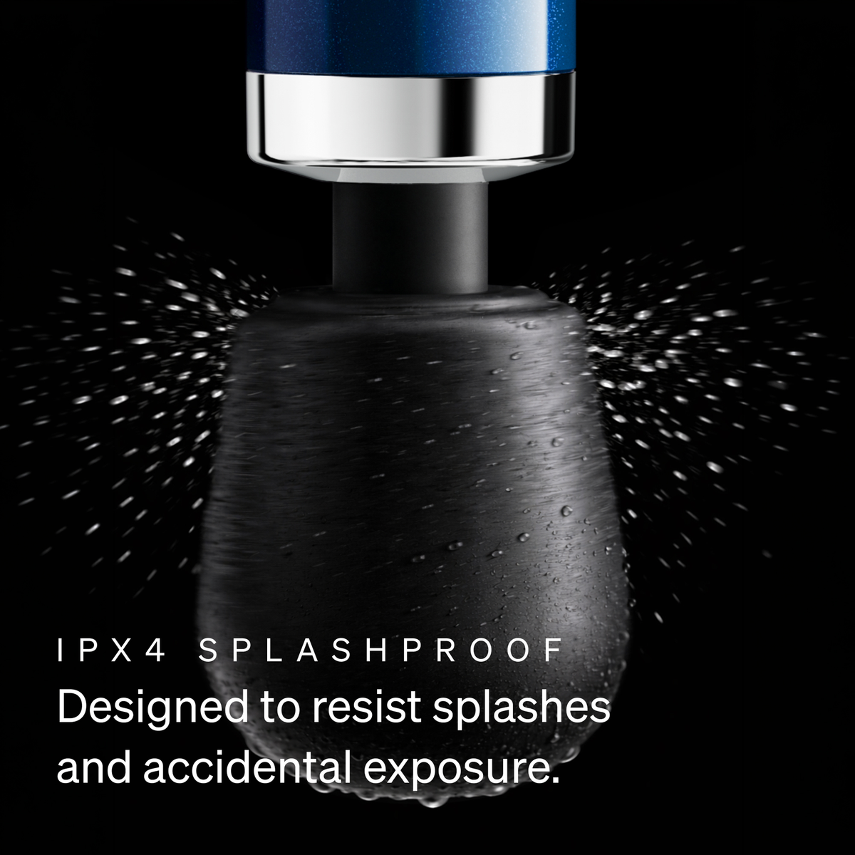 Doxy Die Cast Compact Cordless wand massager head being splashed with water, showing its IPX-4 splashproof design