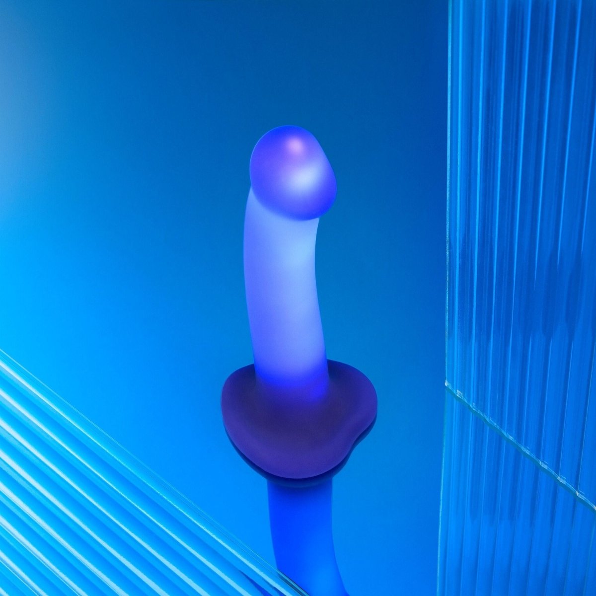 Strap On Me Glow LED Dildo in Purple, glowing close-up