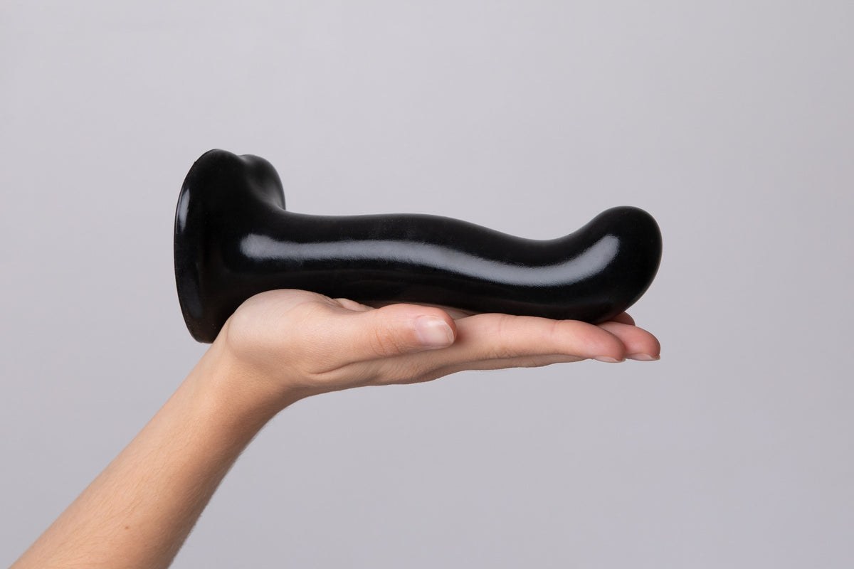 Strap On Me P&G Spot Dildo, held flat in a hand