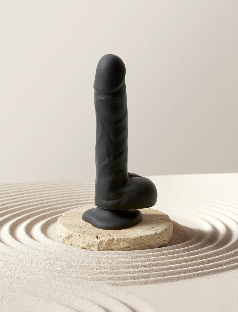 Strap On Me Rotating & Vibrating Realistic Dildo in Black, standing on its suction cup